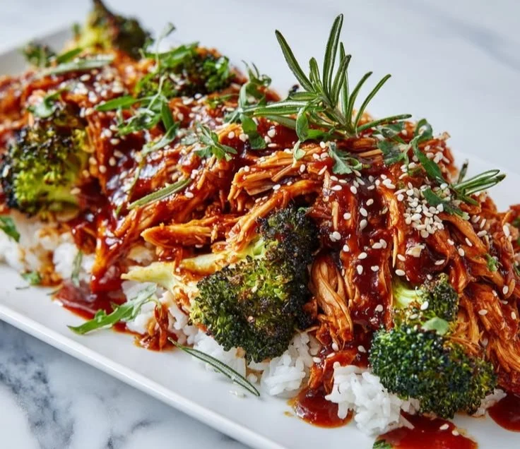 High-protein shredded chicken bowls with fresh vegetables and grains