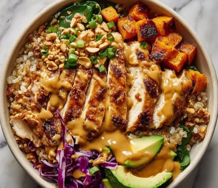 Delicious Peanut Chicken protein bowl with fresh veggies and rice