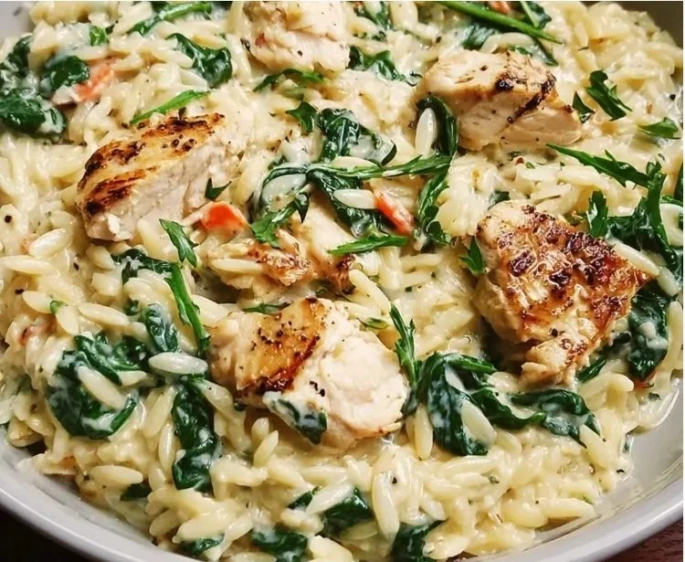 Creamy Boursin Orzo with Chicken and Spinach served in a bowl