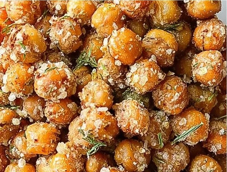 Bowl of crispy roasted chickpeas, a healthy crunchy snack option.