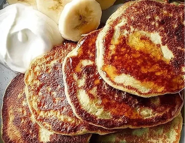 Delicious gluten-free banana pancakes with four ingredients stacked on a plate